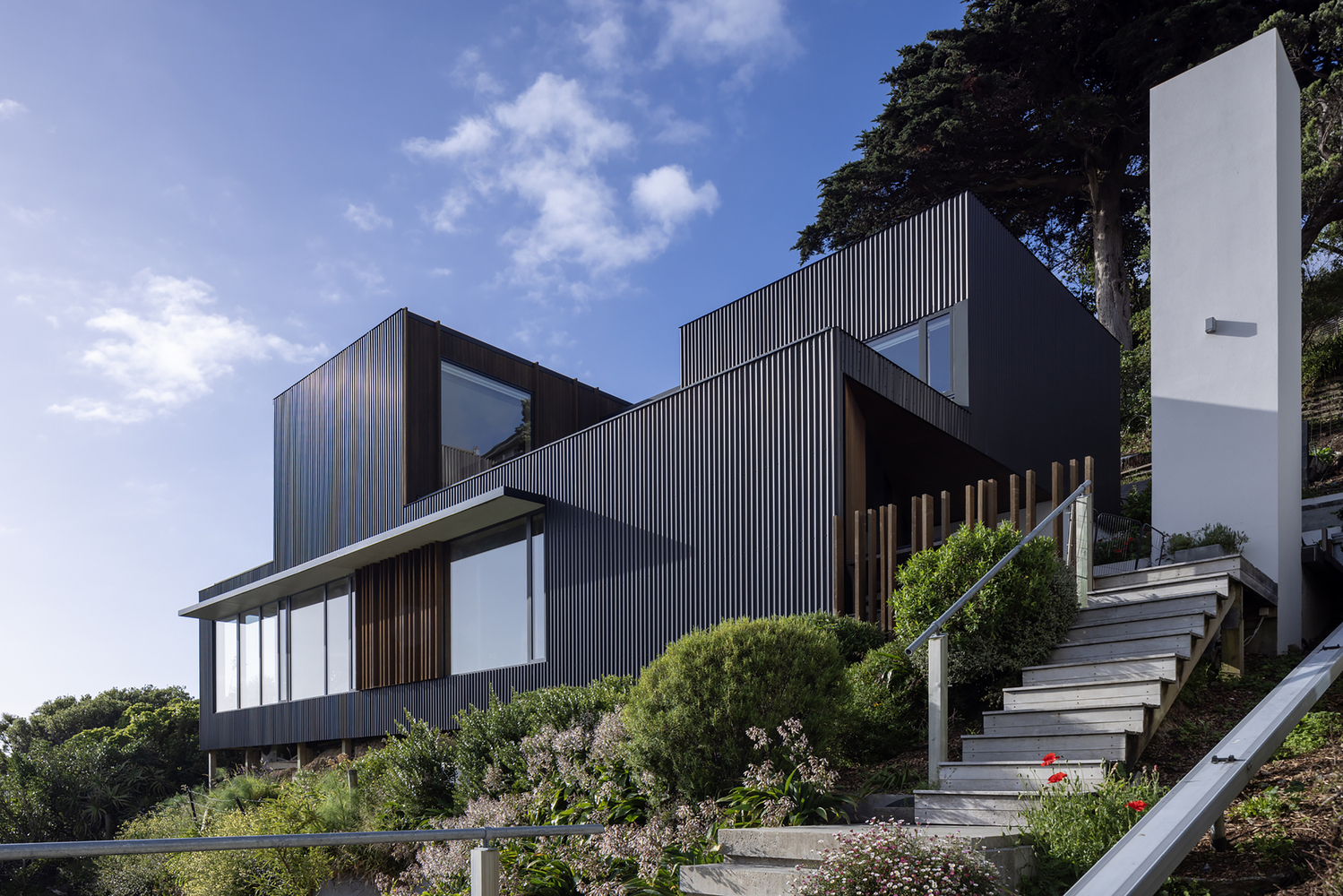 sloped to fit 14 homes that embrace the hill as a catalyst for their design - 25035